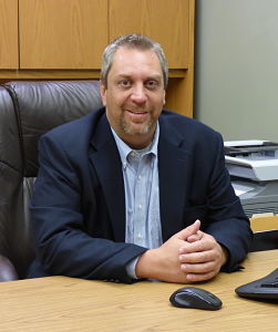 CEO John Williams smiling 